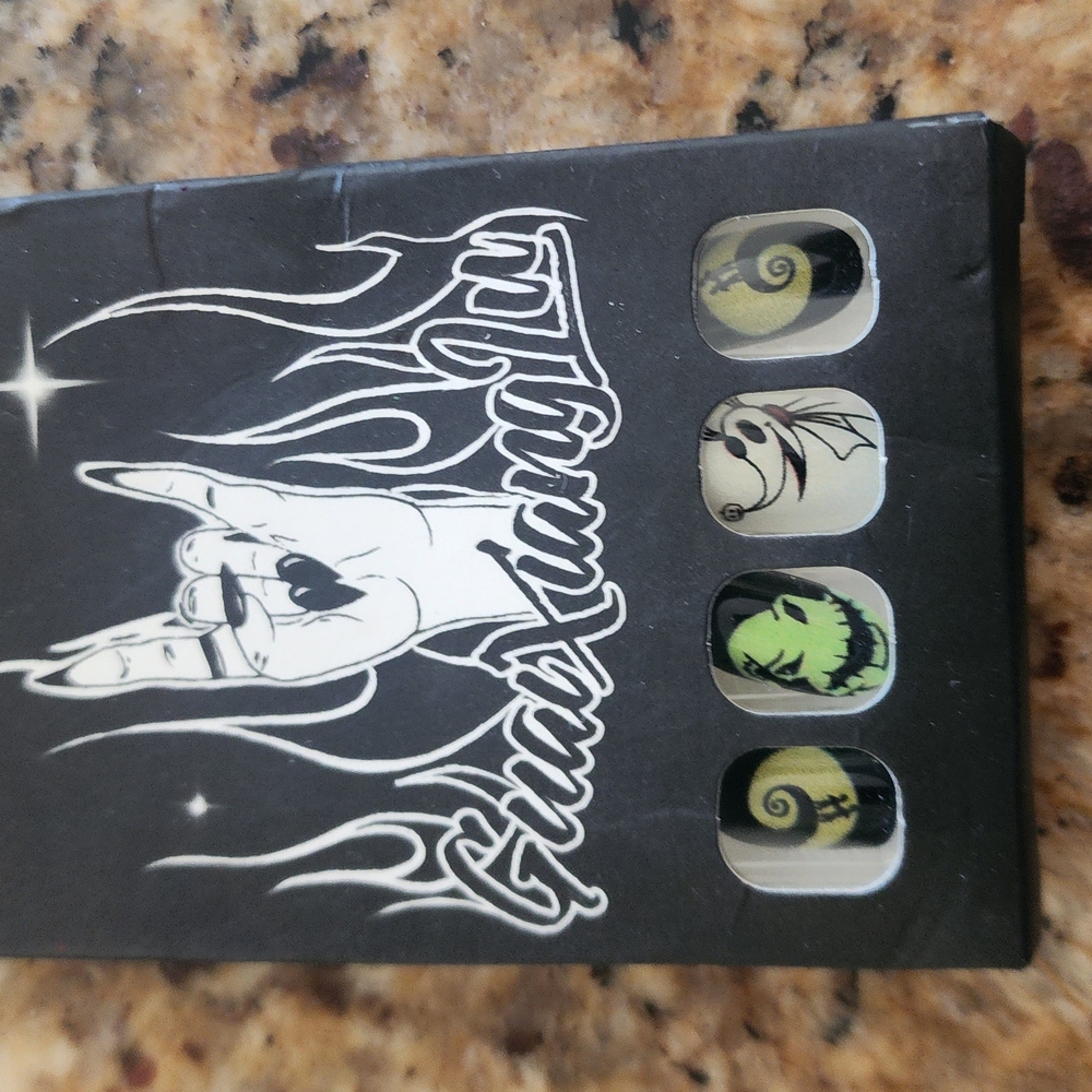 Gothic Nail Art Set with Skulls and Green Accents